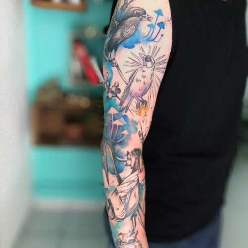 tatouage abstrait graphique tatoueur bras aquarelle couleur grenoble oiseaux