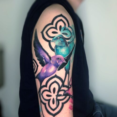tatouage oiseaux envol bras couleur aquarelle grenoble
